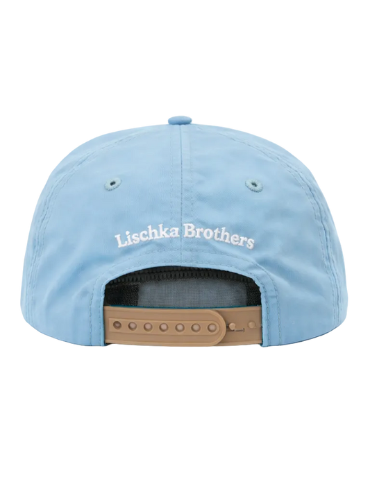 Light blue cap with 'Lischka Brothers' branding on a white background