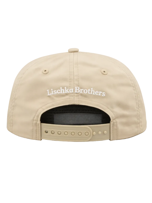 Beige cap with 'Lischka Brothers' logo on a white background