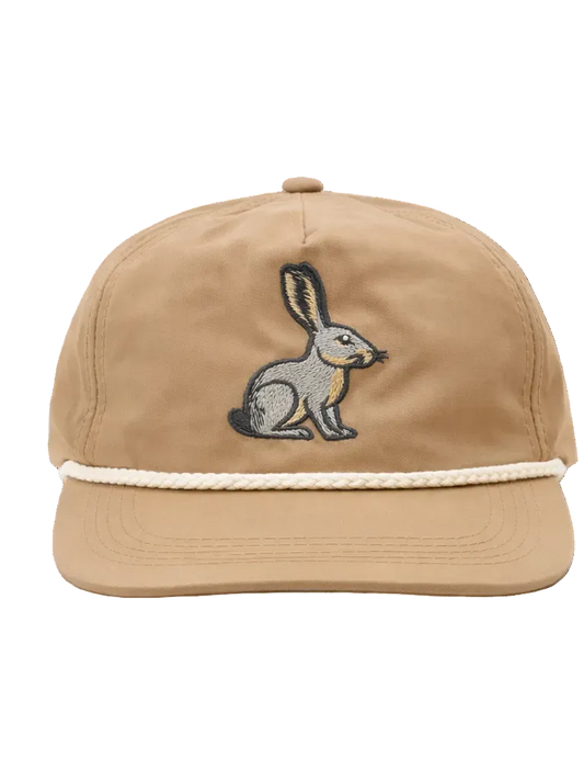 Beige cap with embroidered rabbit design on a white background