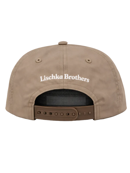 Brown cap with 'Lischka Brothers' logo on a white background