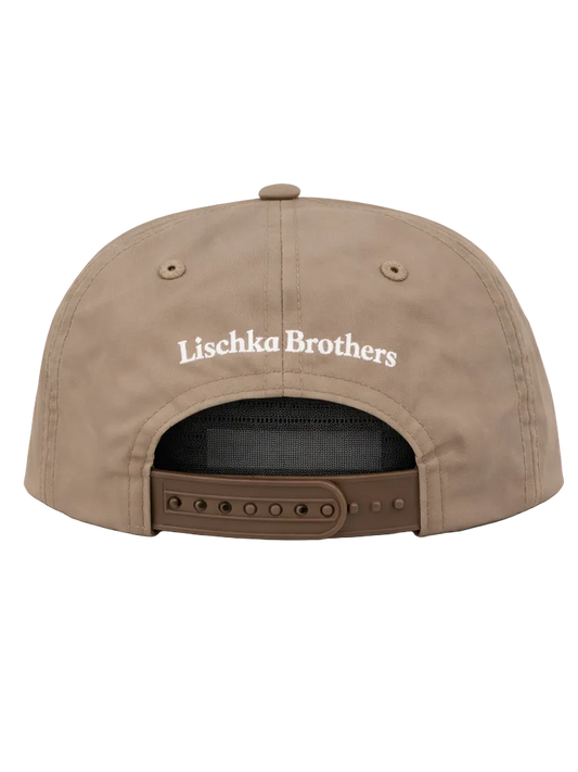 Brown cap with 'Lischka Brothers' logo on a white background