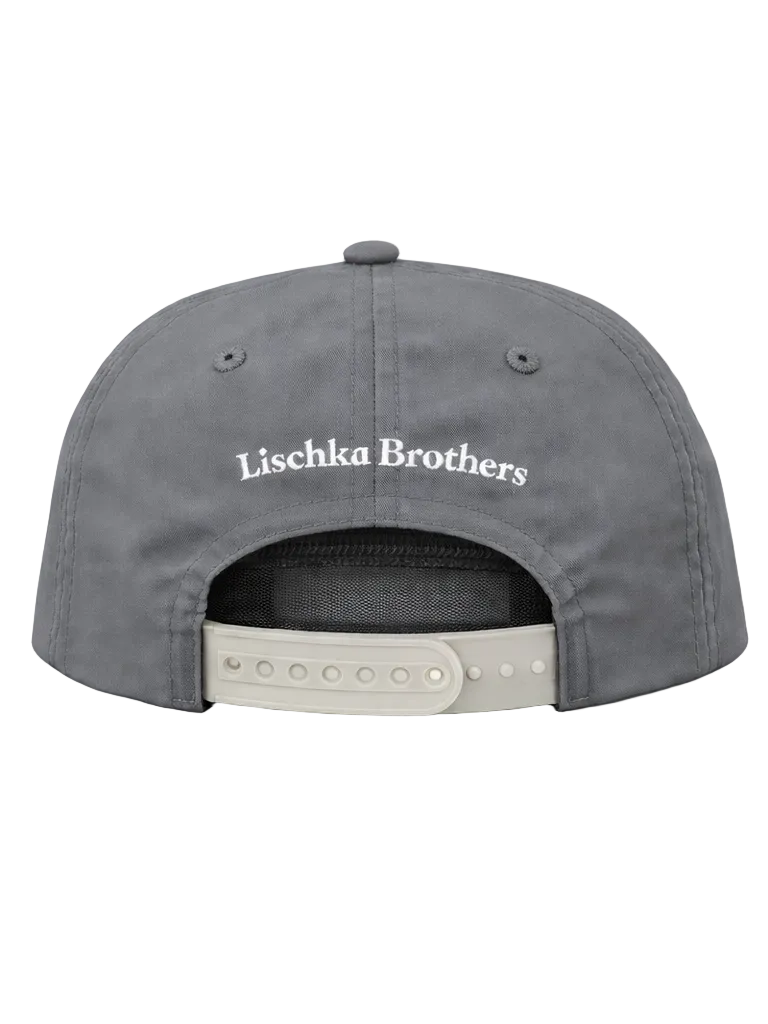 Gray cap with 'Lischka Brothers' branding on a white background