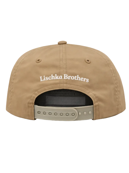 Tan cap with 'Lischka Brothers' logo on the back against a white background