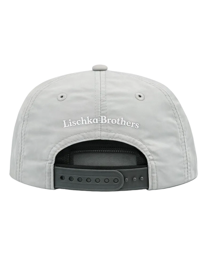 Gray cap with 'Lischka Brothers' logo on a white background