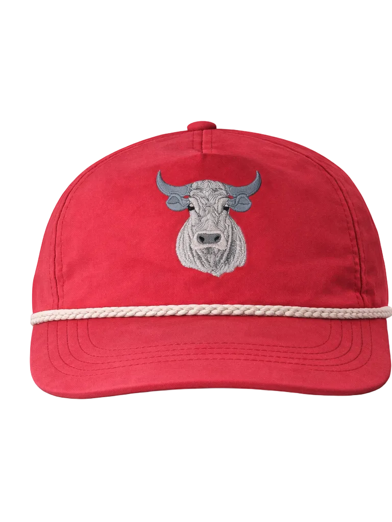 Red cap with a bull emblem and rope detail on a white background