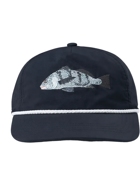 Black cap with a fish design on a white background