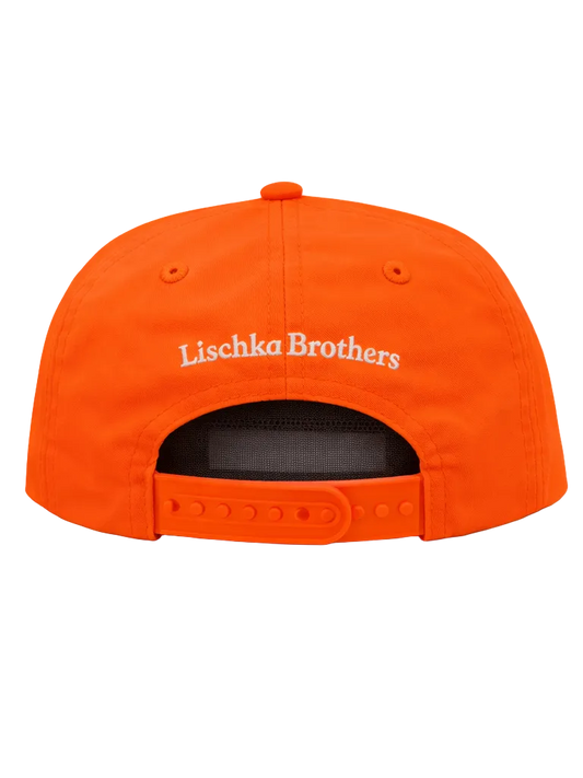 Orange cap with 'Lischka Brothers' branding on a white background