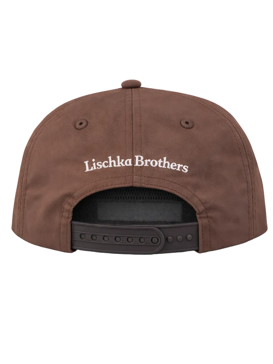 Brown cap with 'Lischka Brothers' logo on a white background